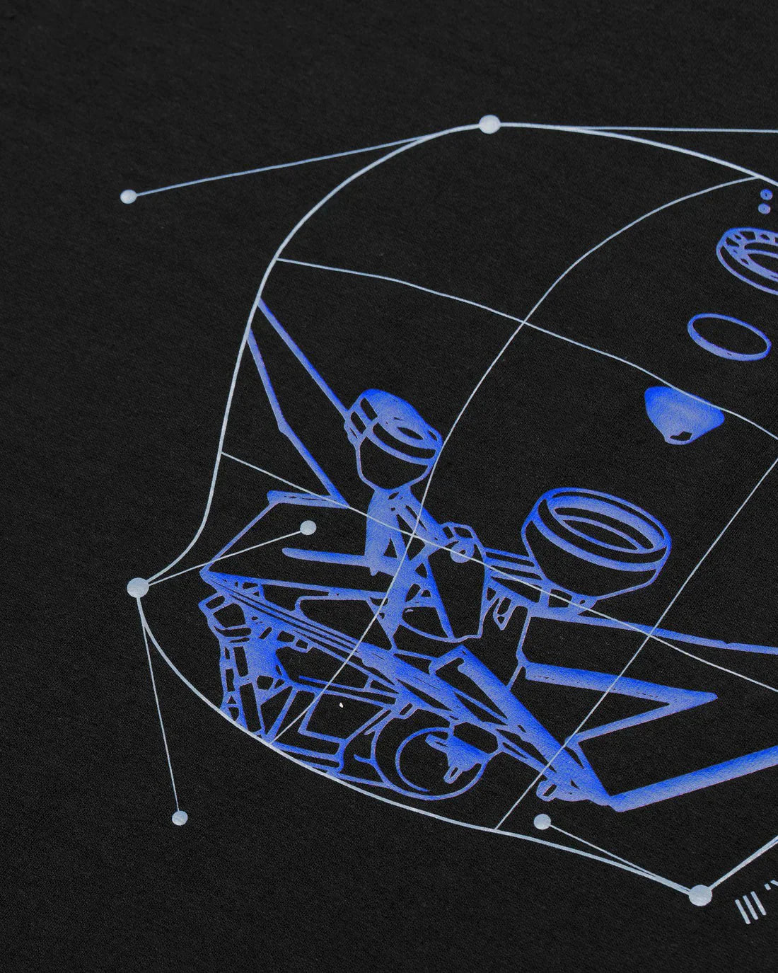 Zoomed-in view of the intricate blueprint graphic design on the back of the Alan Walker Blueprint T-Shirt, featuring a stylized helmet and turntables in blue on black fabric.