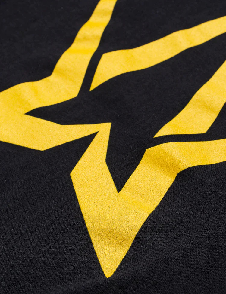 Zoomed-in shot of the Black Walkerverse 2.0 T-Shirt's back graphic, a yellow Alan Walker emblem for a pop of color.