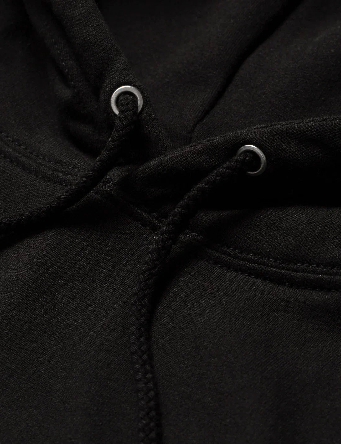 Detailed image showing the quality of the Alan Walker Walkerverse Hoodie's black drawstrings with metal eyelets.